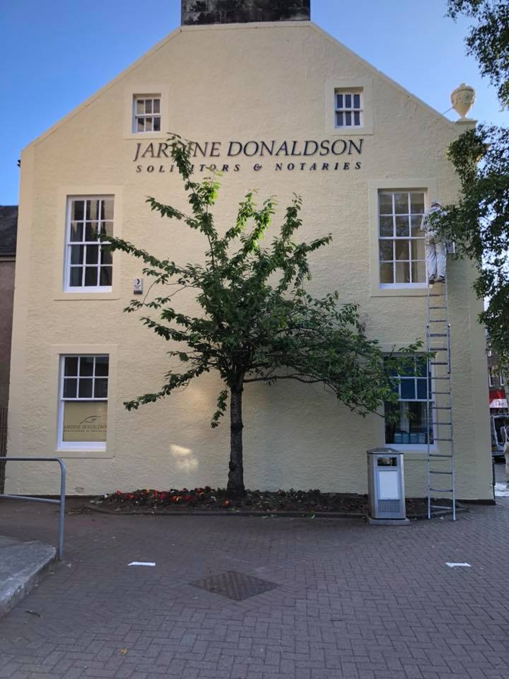 Side of a building that has been freshly painted