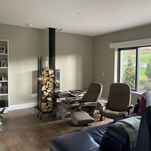 living area with furniture moved inwards because of painted walls